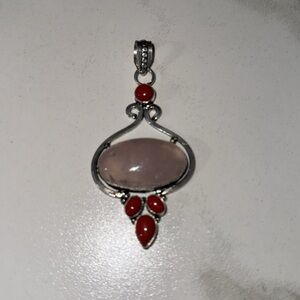 Genuine Gemstone Pendant stamped 925 sterling silver.
